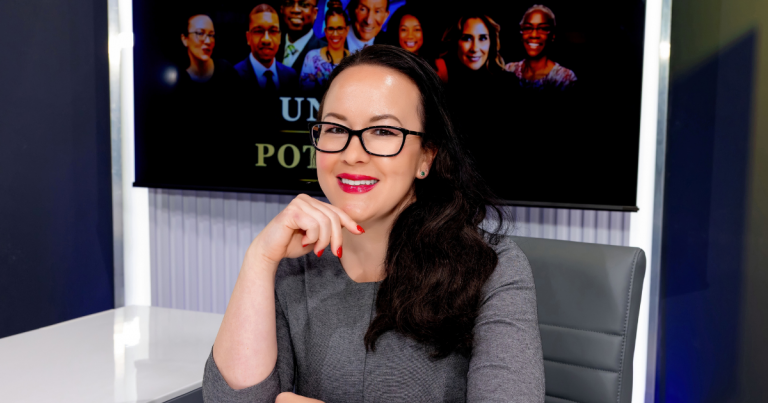 Tara sitting at a desk