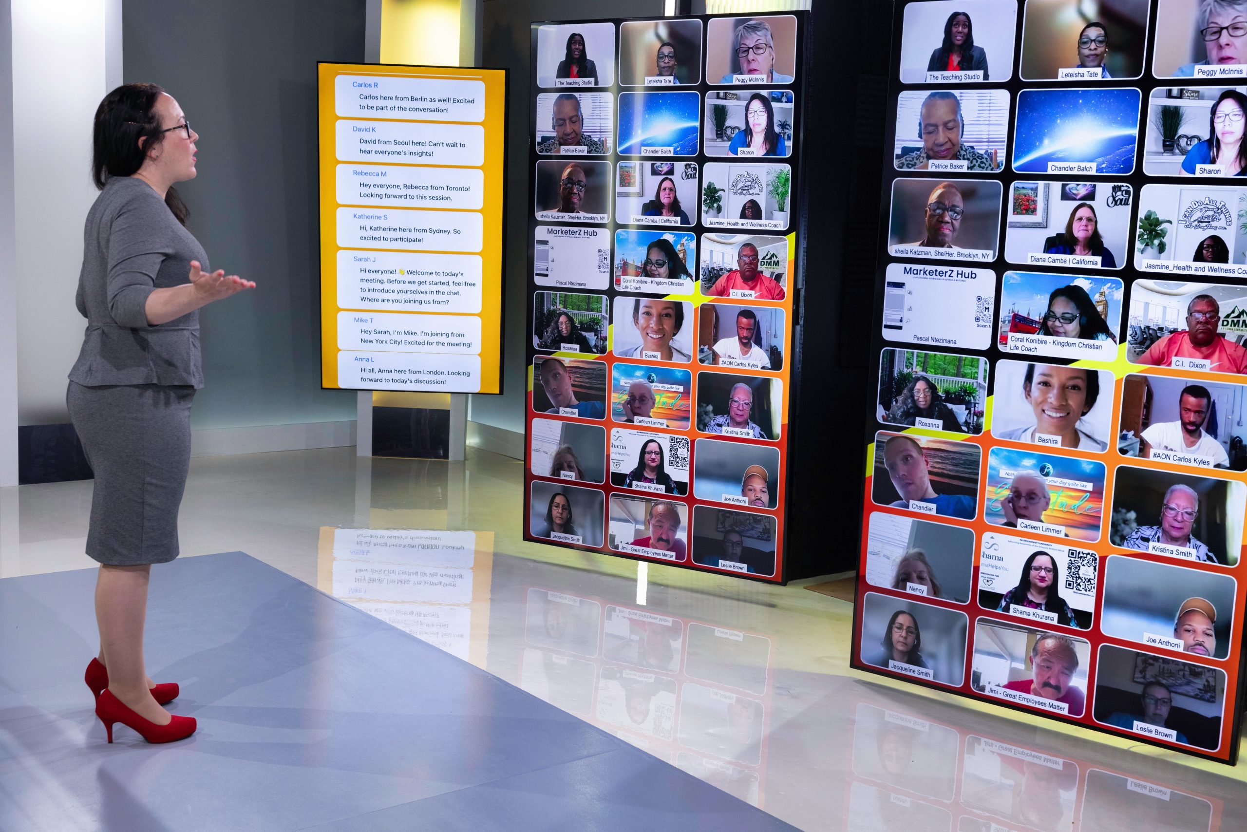 Tara presenting to a virtual audience on a studio video wall