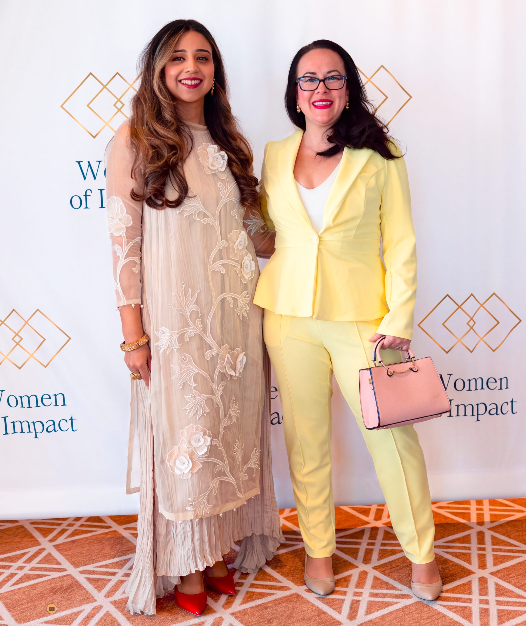 Tara LaFon Gooch with Dr. Amna Shabbir, MD at the 2026 Triangle Women of Impact recognition