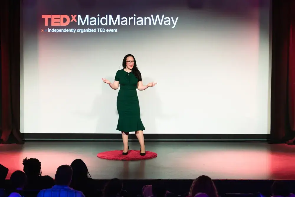 Tara LaFon Gooch speaking on the TEDx stage
